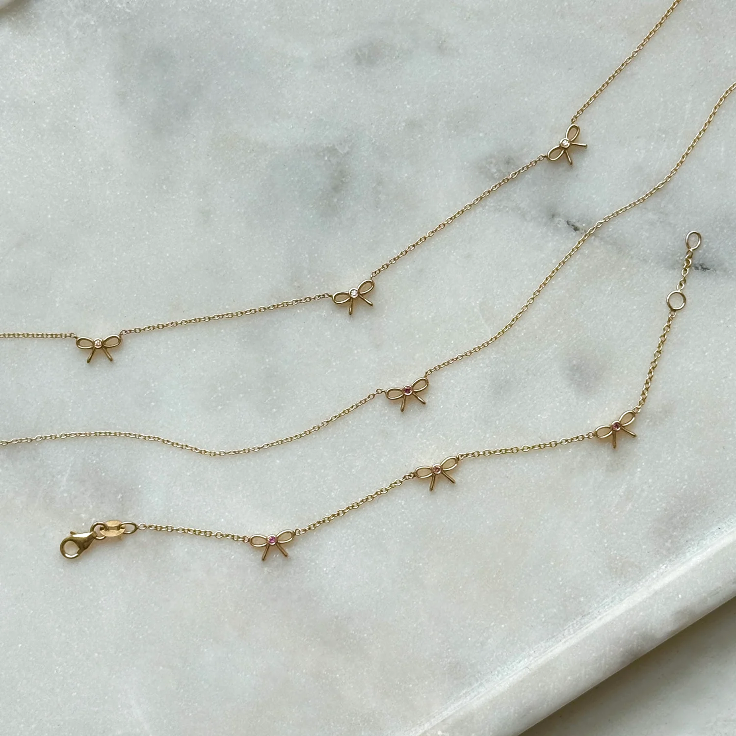 Dainty Pink Sapphire Bow Necklace - Image 4