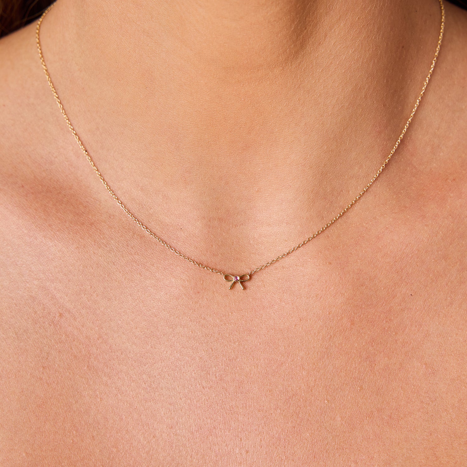 Dainty Pink Sapphire Bow Necklace - Image 8