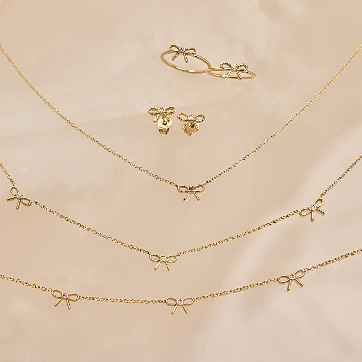 Dainty Pink Sapphire Three Bow Necklace - Image 4